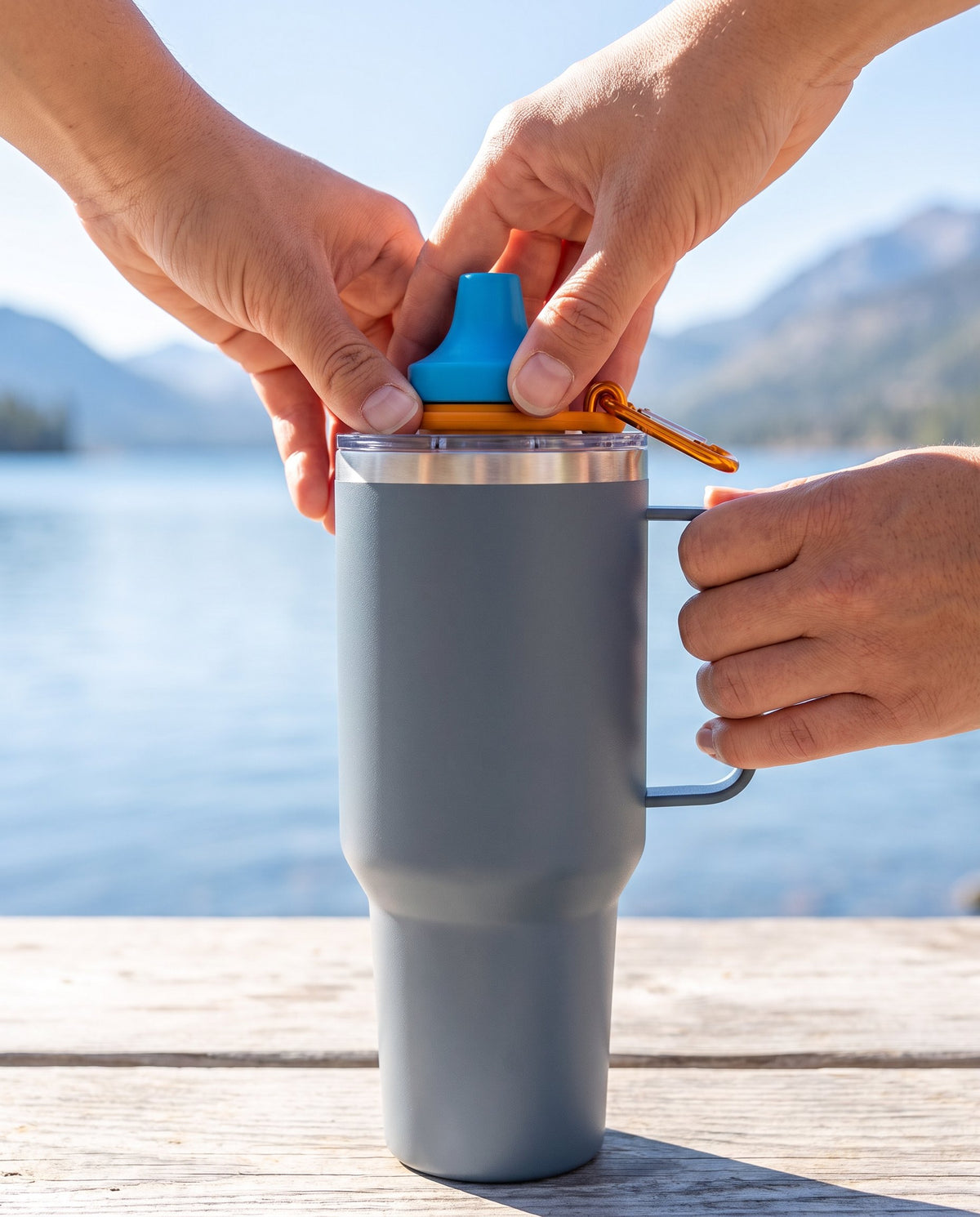 Pressing the Simple Sip adapter onto a 40 oz tumbler